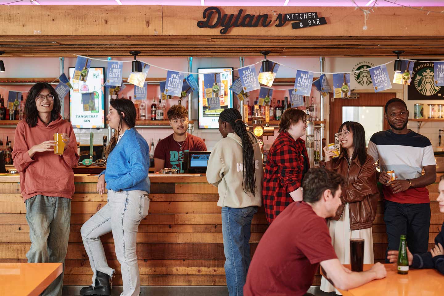 Students hanging out at Dylan's Kitchen &amp; Bar
